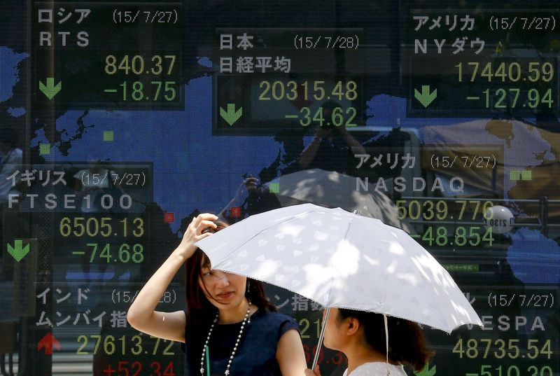 Asia stocks muted amid thin trading, Japan shares jump on record budget plans